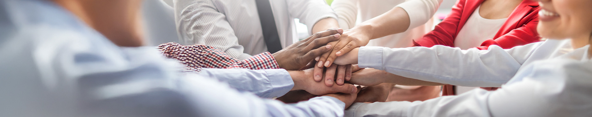 Stack of hands. Unity and teamwork concept.